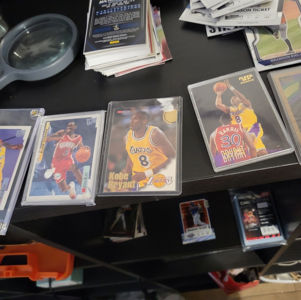 2 kobe rookie cards and 1 Iverson rookie card